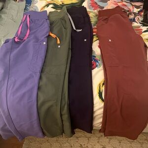 Gently worn Figs scrubs- 3 slim fit and 1 straight leg pair.